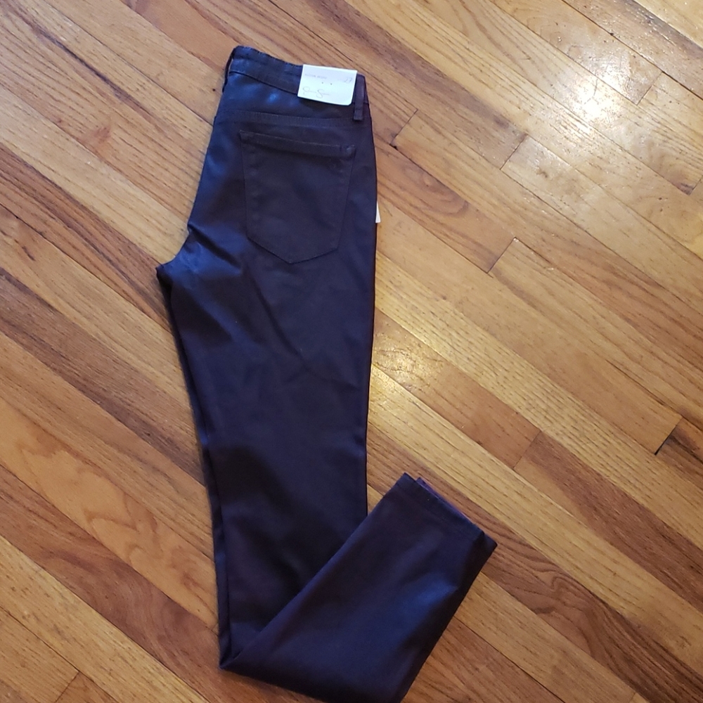 Jessica Simpson super skinny jeans maroon in color